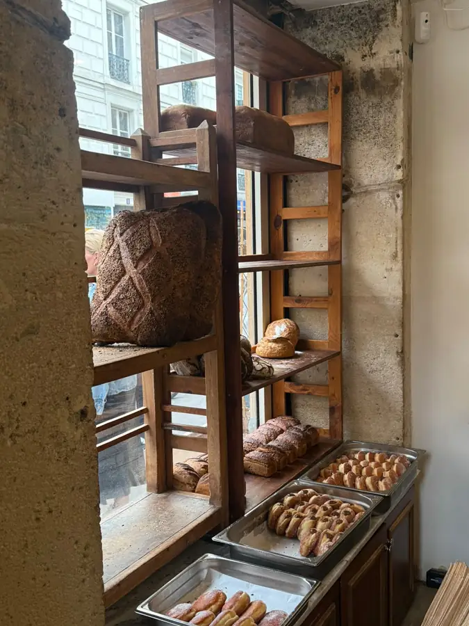 Parisian bakery shelves lined with bread